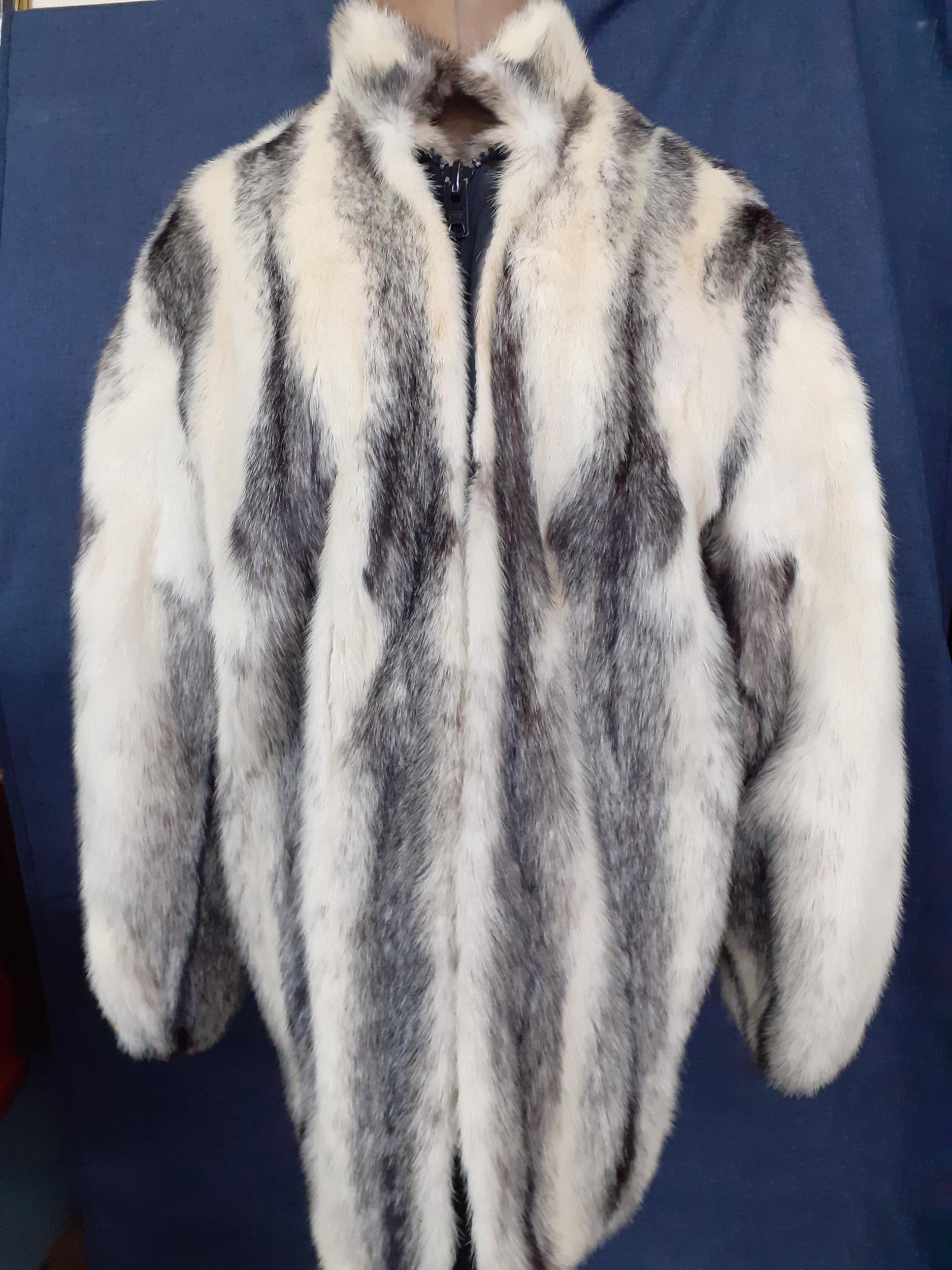 A 1970's Joseph the Furrier white and black cross mink jacket with