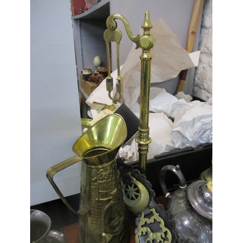 111 - A mixed lot of brassware to include scales mounted on a mahogany base, copper kettle, various weight... 