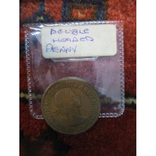 115 - A mixed lot to include a tin of Victorian pennies, and an Elizabeth II 'double headed' penny, reprod... 