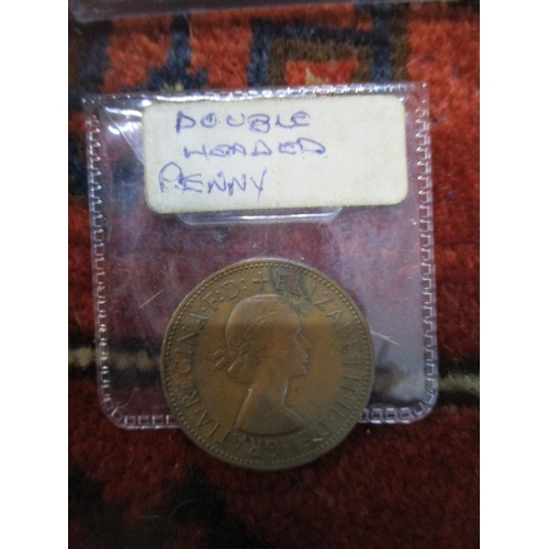 115 - A mixed lot to include a tin of Victorian pennies, and an Elizabeth II 'double headed' penny, reprod... 