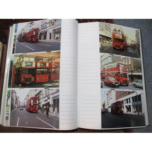 116 - Five albums containing photographs of London Buses, Trains, and Aircraft, postcards of the Royal Fam... 