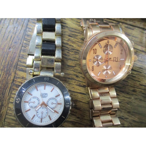 53 - A boxed digital video watch, a Watch Time watch, an Eton quartz watch, a copy of a Breitling Chronom... 