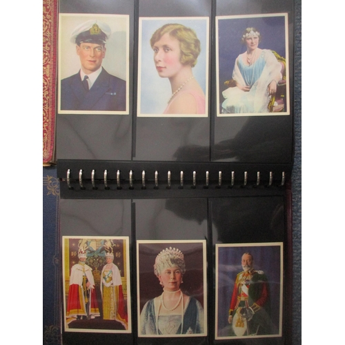 71 - An album of postcards depicting the Royal Family including Edward VII and George V funerals and lyin... 