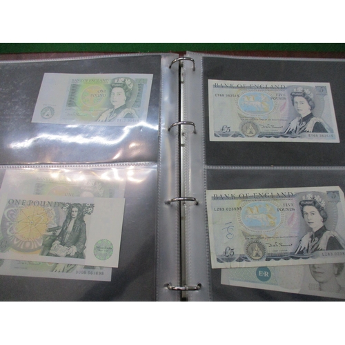 98 - An album of British banknotes to include 10-shilling notes, £1 notes, various dates, £5 and £10 note... 