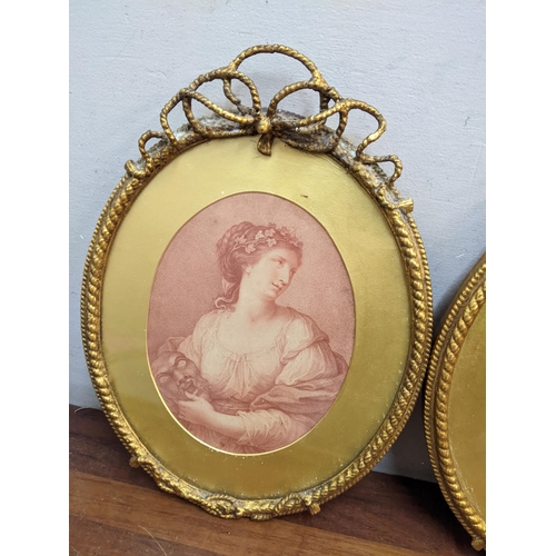 143 - Three 19th century portrait prints of ladies, in oval gilt frames with ribbon surmounts, 37cm h x 28... 