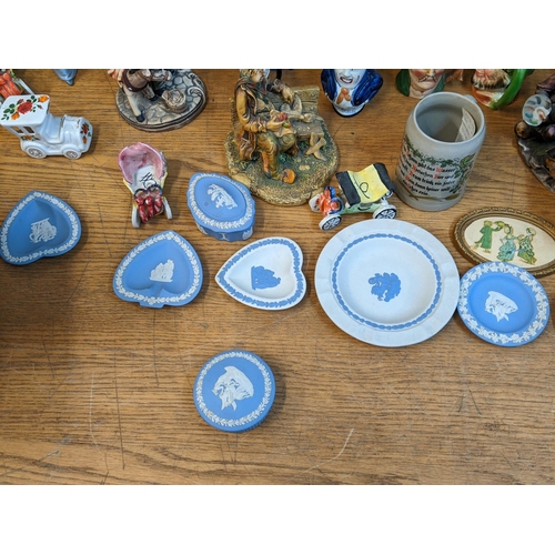 149 - Ceramics to include a Nao figure, Wedgwood, Jasperware, Toby jugs, a thimble collection and other co... 