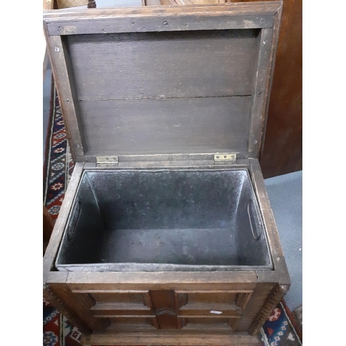 65 - A small oak panelled coal chest with zinc liner
Location:RAM