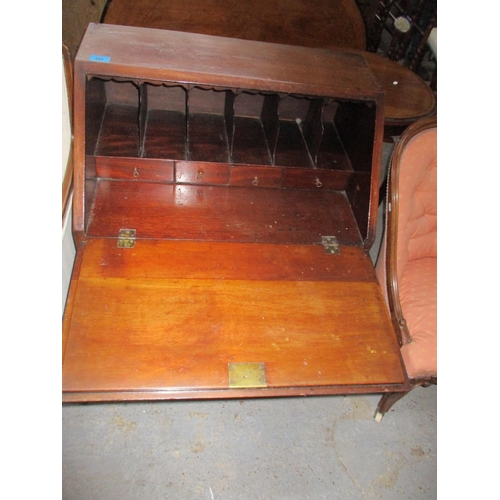 263 - Edwardian mahogany bureau on stand, fall flap revealing a pigeonhole and drawer interior, over one s... 