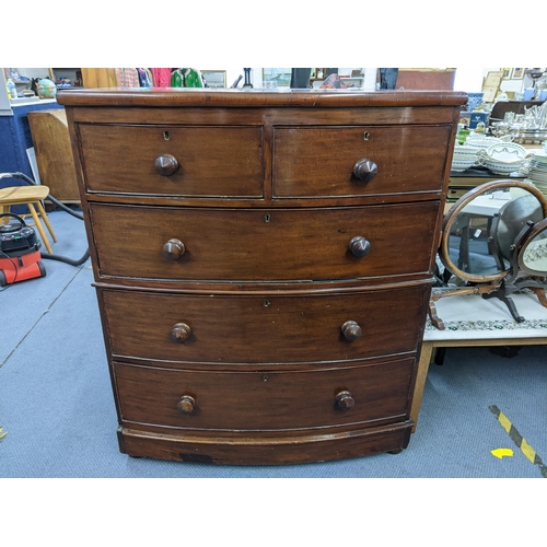 268 - A Victorian mahogany bow front chest of two short and three long drawers 118cm h x 99.5cm w
Location... 