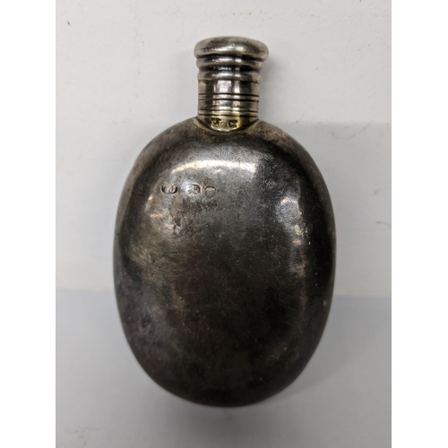 1 - A Victorian silver hip flask, London 1875 60.5g Location: CAB1