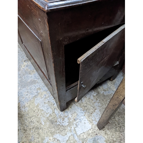 103 - An 18th century oak chest with a hinged top over a panelled front A/F
Location: G