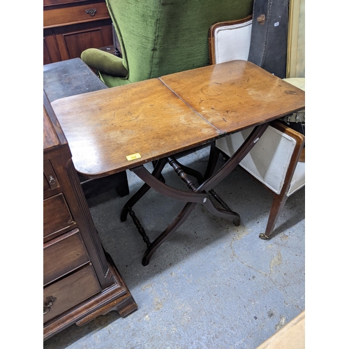 104 - A late 19th century mahogany coaching table on splayed legs
Location: G