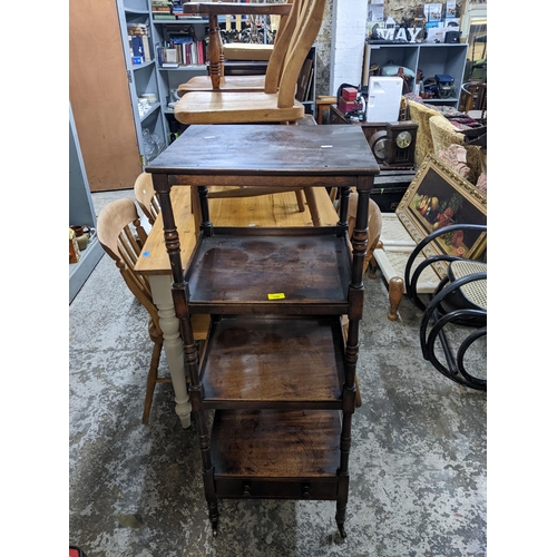 106 - A Victorian mahogany four tier whatnot with drawer and mahogany drop leaf work table.
Location: BWR