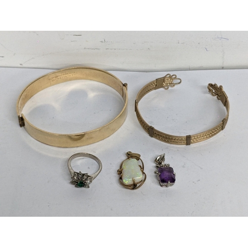 109 - Jewellery to include an opal doublet in a 9ct gold frame, a silver pendant, a white gold ring and tw... 