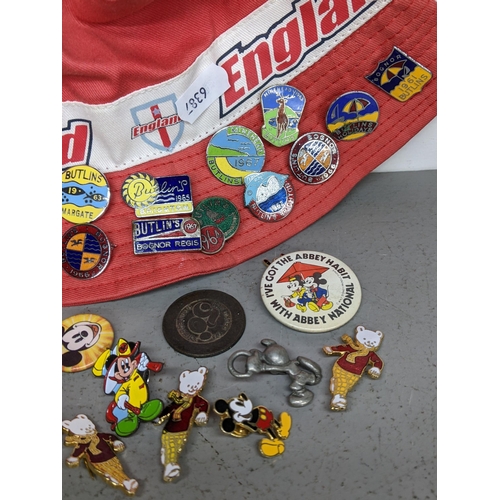 114 - A selection of vintage badges to include 1960's Butlins badges, Mickey Mouse and others
Location: TA... 