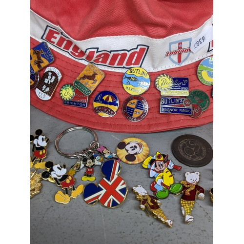 114 - A selection of vintage badges to include 1960's Butlins badges, Mickey Mouse and others
Location: TA... 