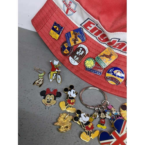 114 - A selection of vintage badges to include 1960's Butlins badges, Mickey Mouse and others
Location: TA... 