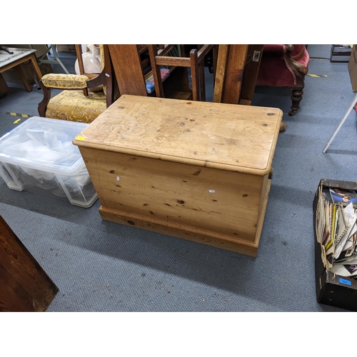 124 - A modern pine blanket box having a hinged top and on a plinth base, 54cm h x 86cm w, together with a... 