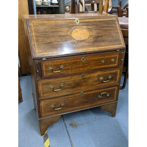 126 - An Edwardian mahogany bureau having a fall flap above three drawers 96cm h x 76cm w Location: LAM