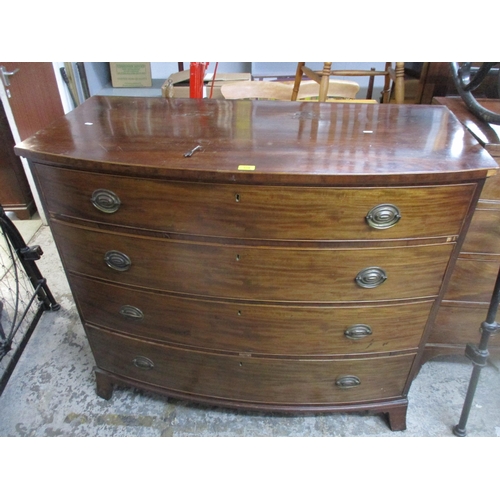 134 - A Georgian mahogany bow fronted chest of four graduated drawers on bracket feet (with key) 108.5cm x... 