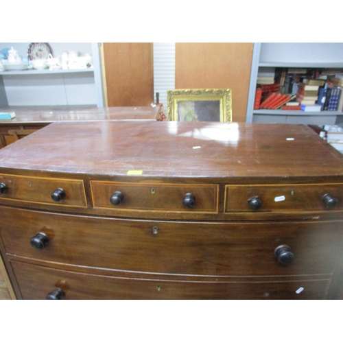 137 - A Victorian mahogany bow fronted chest of drawers, three short drawers over four graduated drawers w... 