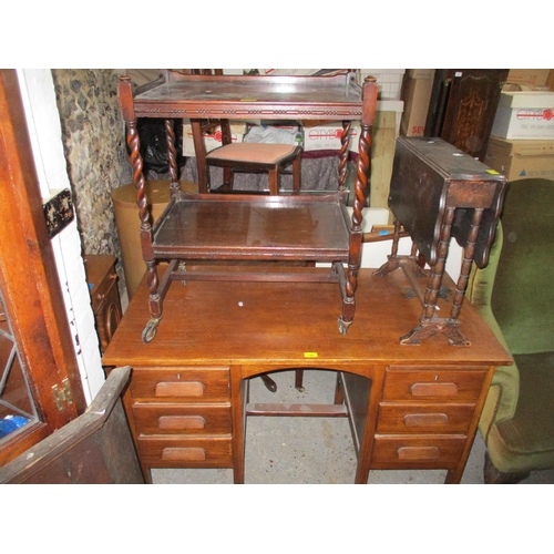 142 - An Early to mid 20th century oak pedestal desk with six pedestal drawers on square legs, 76cm x 122c... 