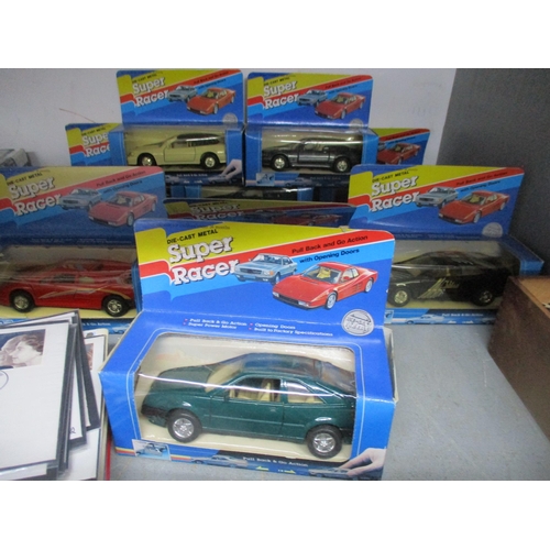 147 - A mixed lot to include an album of First Day covers, nine boxed Super Racer diecast model cars, boxe... 