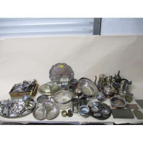 153 - A selection of white metal and silver plated items to include a wine coaster, mixed cutlery, Austria... 