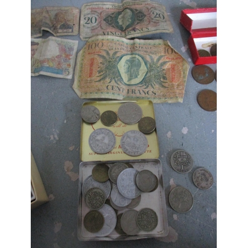 154 - A small group British, Portuguese and other coins and banknotes
Location: BWR