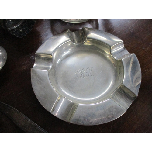 159 - A selection of silver, silver plate and white metal items to include a Mappin & Webb silver ashtray ... 