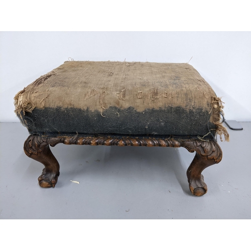 171 - An early 20th century mahogany small footstool raised on claw and ball feet
Location: A1F