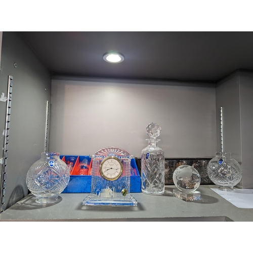 179 - Mixed glass to include a Waterford Crystal mantel clock, Stuart Crystal, boxed glass and a glass glo... 