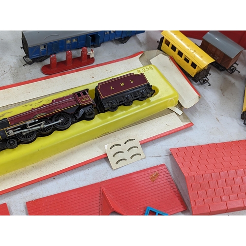 183 - Mixed model railway items to include tri-ang Princess Elizabeth engine, and other rolling stock, and... 