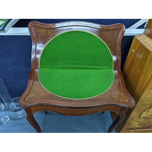 194 - A reproduction mahogany serpentine fronted fold over card table on cabriole legs, 76.5cm h x 84.5cm ... 