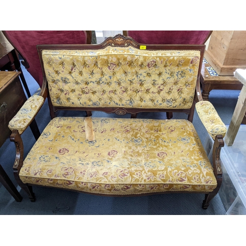 207 - A late Victorian mahogany marquetry inlaid two seater salon sofa
Location: LAM