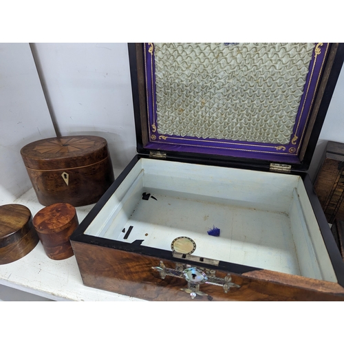 216 - A collection of treen boxes to include a Victorian mother of pearl inlay jewellery box A/F, a Georgi... 