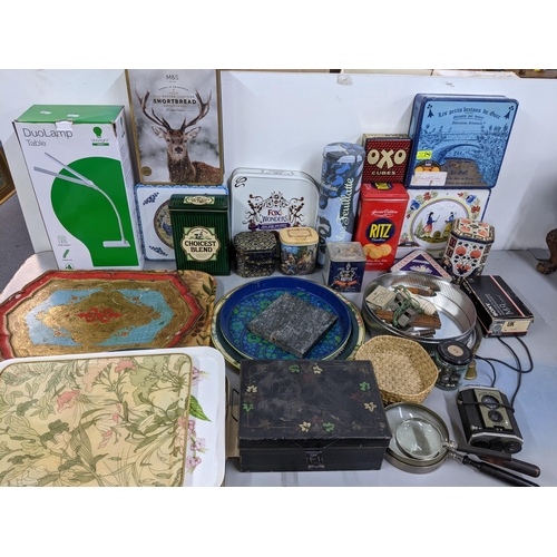 224 - A mixed lot to include vintage trays, tins, boxed duolamp, The Acme Whistles, Brownie Reflex camera ... 