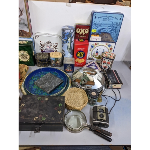 224 - A mixed lot to include vintage trays, tins, boxed duolamp, The Acme Whistles, Brownie Reflex camera ... 