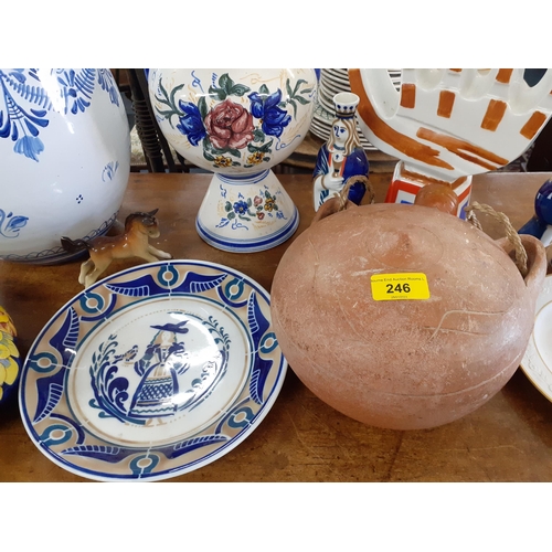 246 - Continental ceramics and pottery to include a Portuguese clay wine vessel A/F, a painted Spanish twi... 