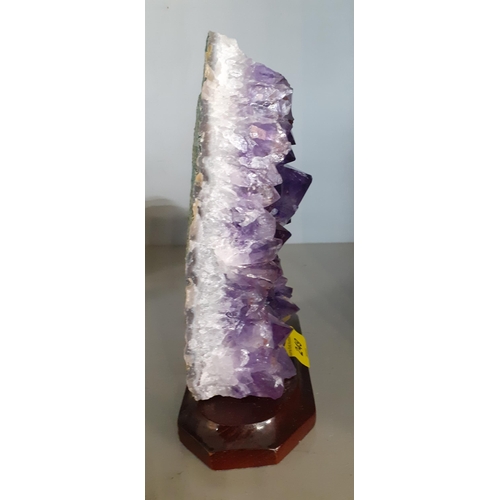 249 - A large amethyst cluster specimen mounted on a treen base
Location: 11.1
proceeds to Chengelo Edicat... 