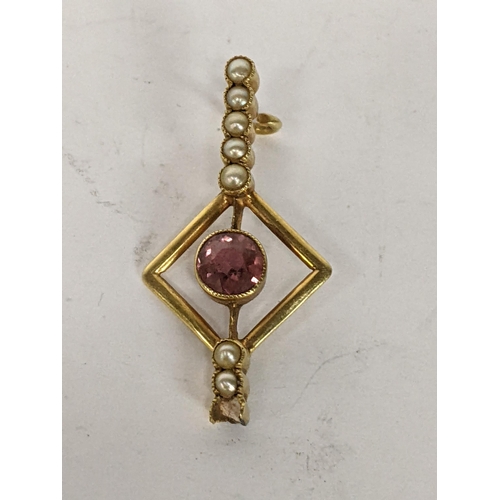 27 - A 15ct gold brooch inset with seed pearls and amethyst, 1.9g A/F
Location: CAB5