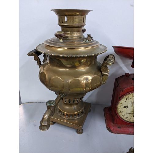 282 - A 19th century brass samovar together with mixed metalware and a set of vintage weighting scales
Loc... 
