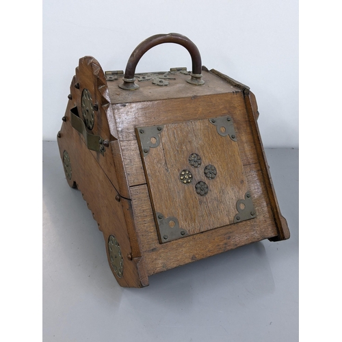 283 - A late 19th/early 20th century oak coal box with applied brass mounts
Location: 1.5
