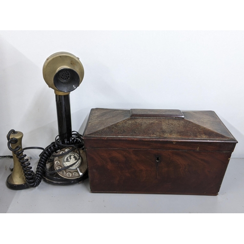 287 - An early 19th century mahogany tea caddy together with a 'Conversation Pieces' candlestick telephone... 