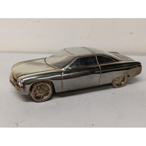 49 - A Jacques Nasser sterling silver promotion model of a car inscribed 'Seasons Greetings Jacques Nasse... 