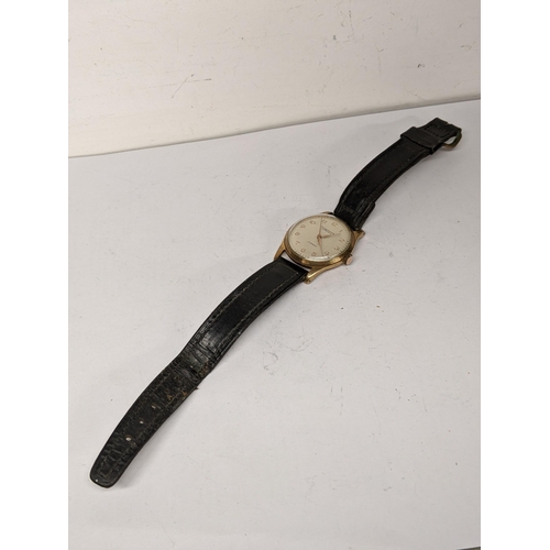 56 - A mid 20th century 9ct gold Gents mid size Winegartens London manual wind wristwatch.
Location: CAB1