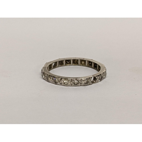 75 - A white metal diamond full eternity band, A/F some diamonds missing, 2.5g
Location: RING