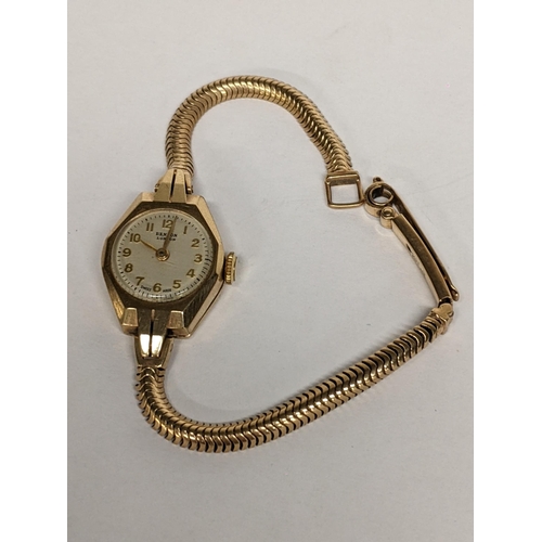 79 - A mid 20th century 9ct gold J.W Benson ladies wristwatch on a yellow metal bracelet, 14.7g
Location:... 