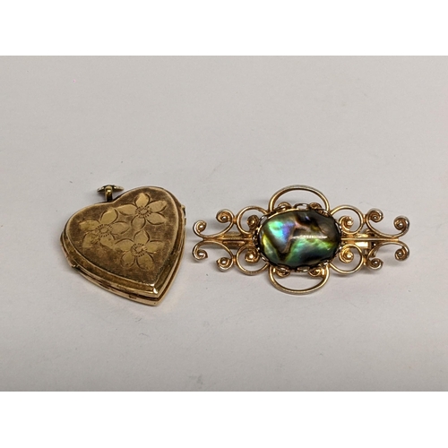 85 - A 9ct gold heart shaped pendant, 4.8g, together with a gold plated brooch
Location: CAB5