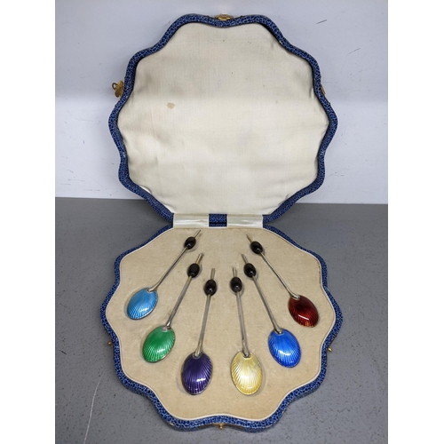 86 - A set of six silver coffee spoons with bean terminals and enamelled bowls A/F
Location: 7.5